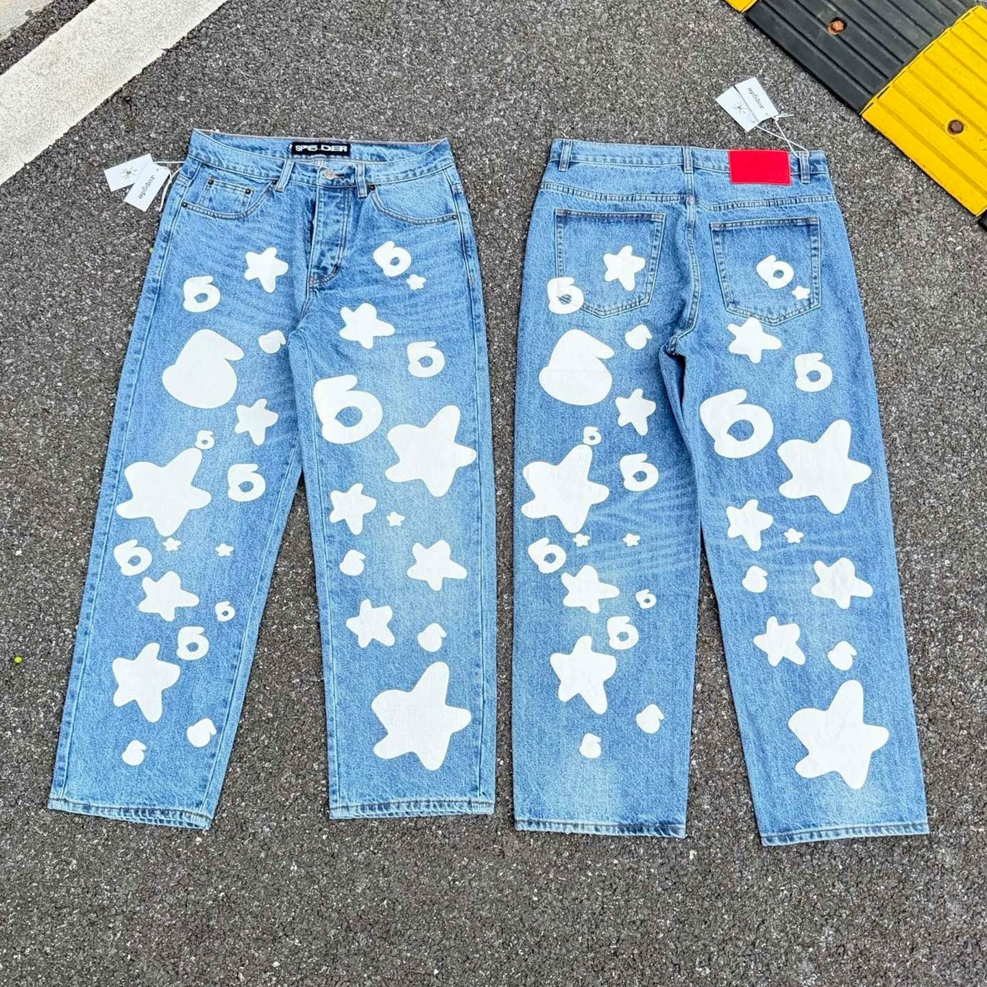 sp5der Bold White Star & Number‑6 Print Light‑Wash Baggy Jeans