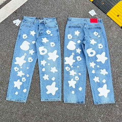 sp5der Bold White Star & Number‑6 Print Light‑Wash Baggy Jeans