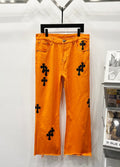 Chrome Hearts Bright Orange & Black Cross Patch Denim Jeans