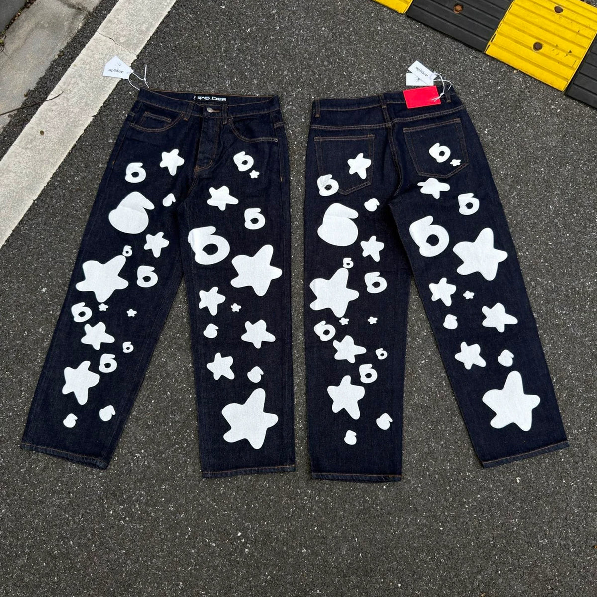 sp5der White Star & Number‑6 Print Raw Indigo Baggy Jeans