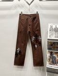 Chrome Hearts Zebra-Pattern Cross Applique Denim Pants